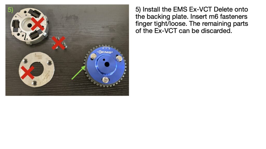 EMS blue anodized VCT lockout assembly installed onto the factory backing plate using supplied hardware. Red X marks identify factory VCT components that are no longer required. A green arrow highlights the completed EMS lockout assembly ready for installation.